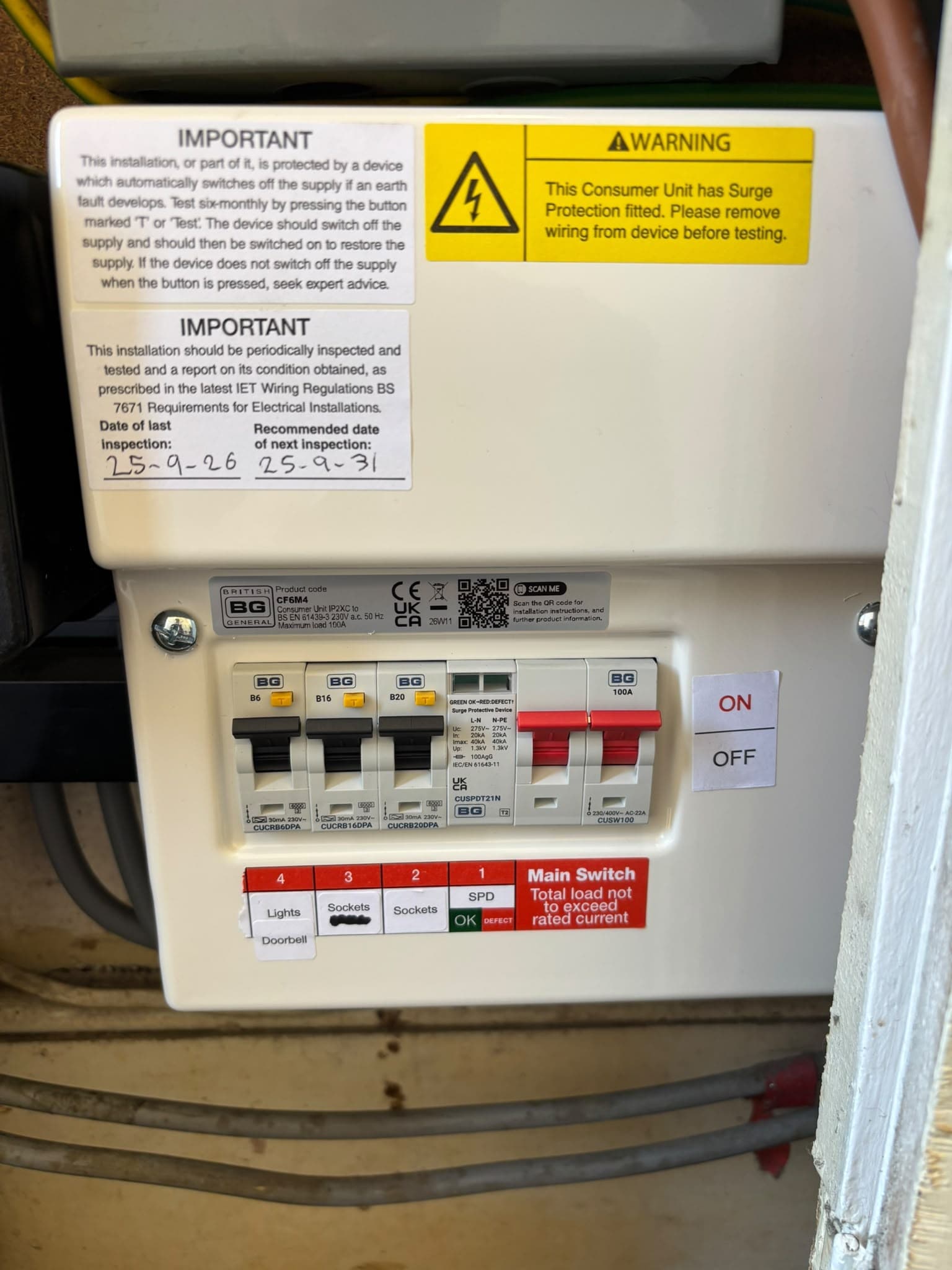 Consumer unit photographed in the communal-area EICR used in our verified project examples.