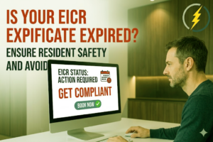 A London landlord checking a computer screen for EICR compliance status and booking options to ensure tenant safety.